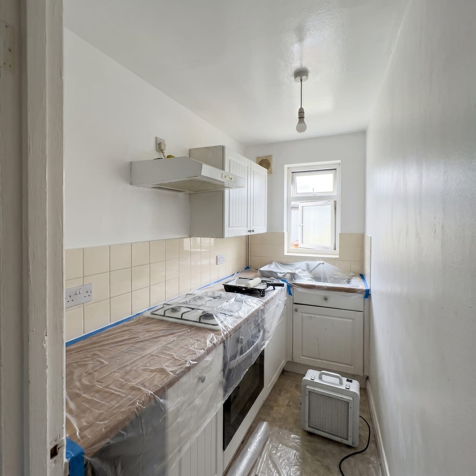 After: Streatham terrace - kitchen ceiling mould treated with HEPA filtration and biocide, ventilation upgraded, ceiling professionally refinished, 12-month warranty
